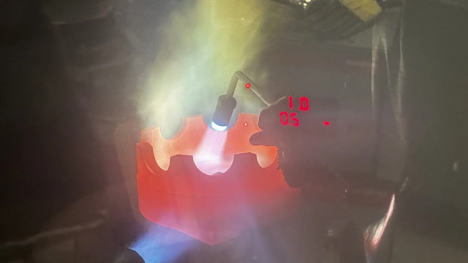 Spray-and-fuse coating being fused with a torch